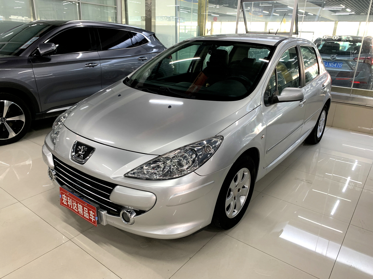 標(biāo)致 307  2010款 兩廂 1.6L 自動(dòng)舒適版圖片