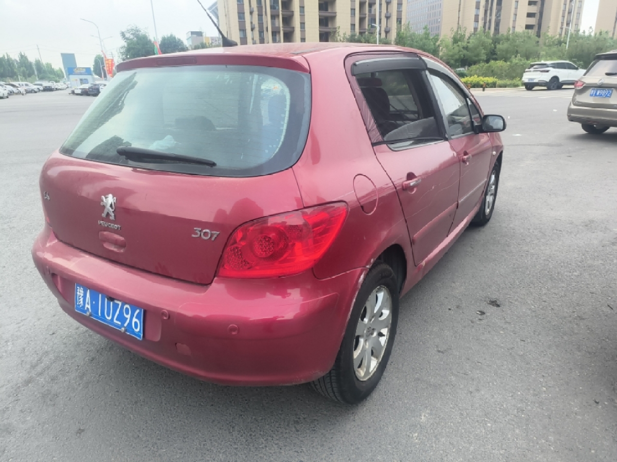 標(biāo)致 307  2010款 兩廂 1.6L 自動(dòng)舒適版圖片