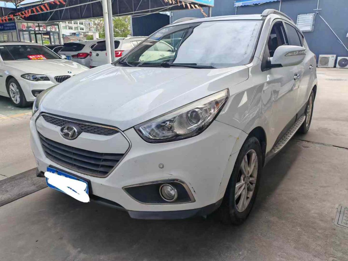 現(xiàn)代 ix35  2012款 2.0 GLS 四驅(qū)尊貴導(dǎo)航版圖片