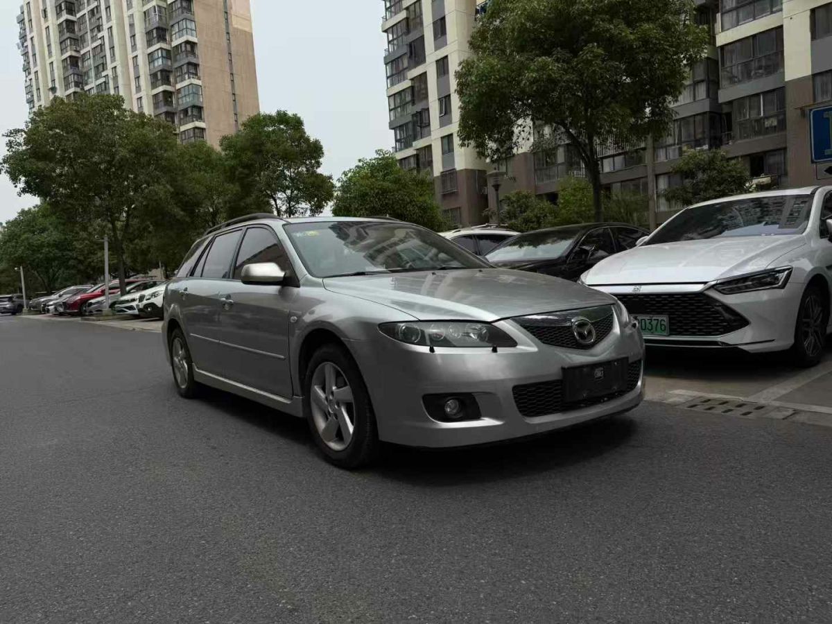 馬自達(dá) 馬自達(dá)3  2009款 1.6L 自動(dòng)天窗版圖片
