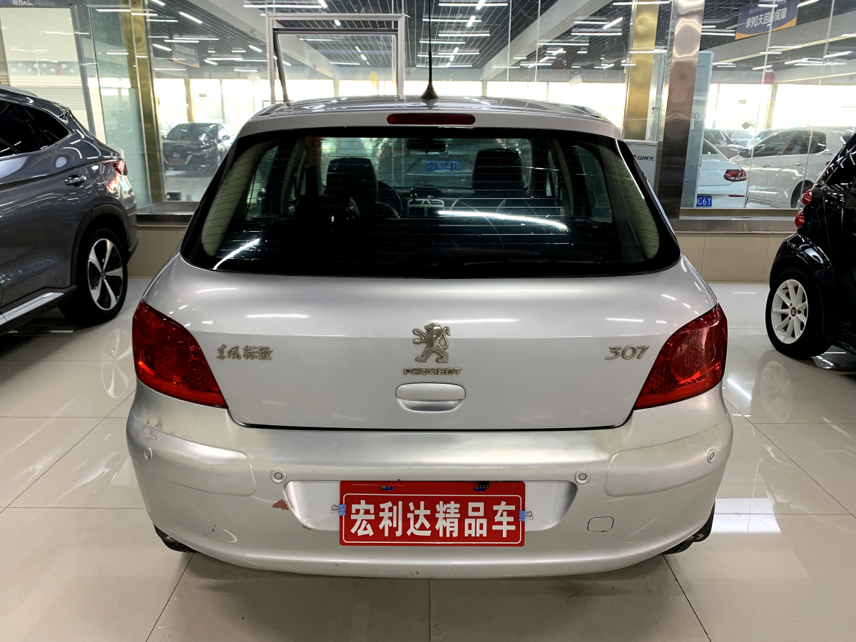 標(biāo)致 307  2010款 兩廂 1.6L 自動(dòng)舒適版圖片