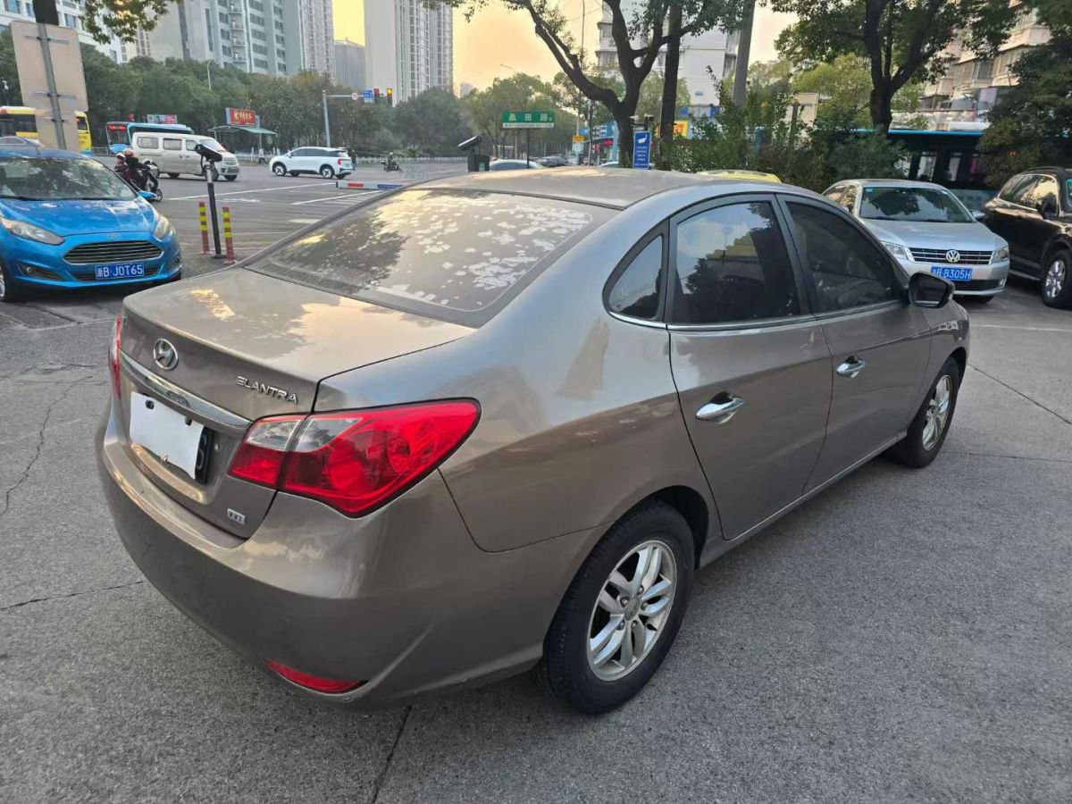 現(xiàn)代 悅動  2011款 1.6L 自動頂級型圖片