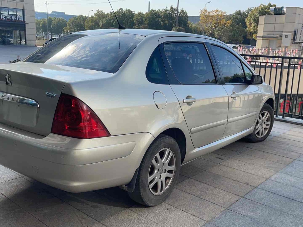 標(biāo)致 307  2010款 三廂 2.0L 自動舒適版圖片