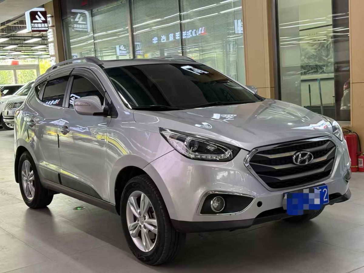 現(xiàn)代 ix35  2012款 2.0 GLS 四驅(qū)尊貴導(dǎo)航版圖片