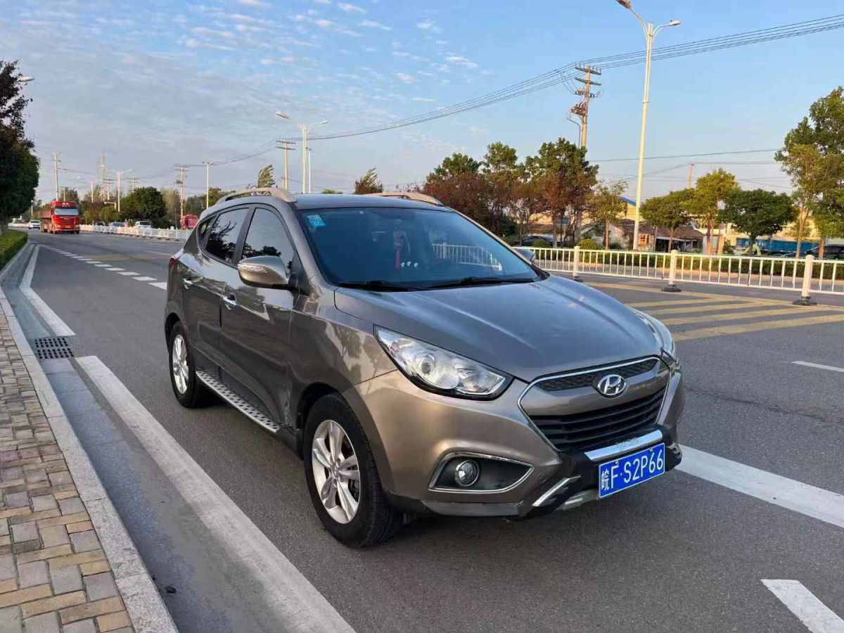 現(xiàn)代 ix35  2012款 2.0 GLS 四驅(qū)尊貴導航版圖片