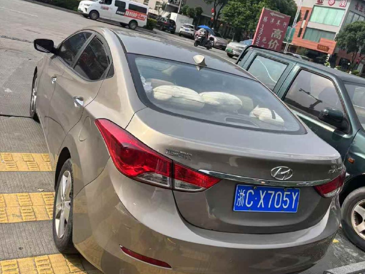 現(xiàn)代 朗動(dòng)  2013款 1.6L 自動(dòng)尊貴型圖片